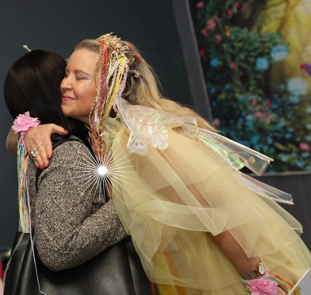 Sunny sharing a hug with a guest